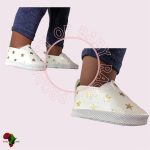 White loafers with stars